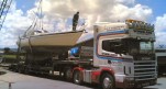 A boat being transported on the back of one of our lorries