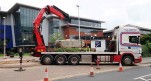 Heavy boulder being lifted at Lincoln college