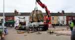 Heavy boulder being installed at Lincoln college