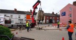 Heavy boulder being installed at Lincoln college