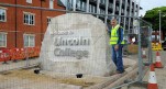 Installation of heavy boulder complete